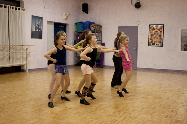 Young children practicing dance at a Milton dance studio
