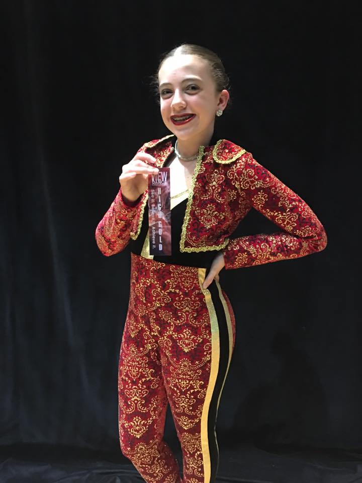 Young competitive dancer with 3rd place award