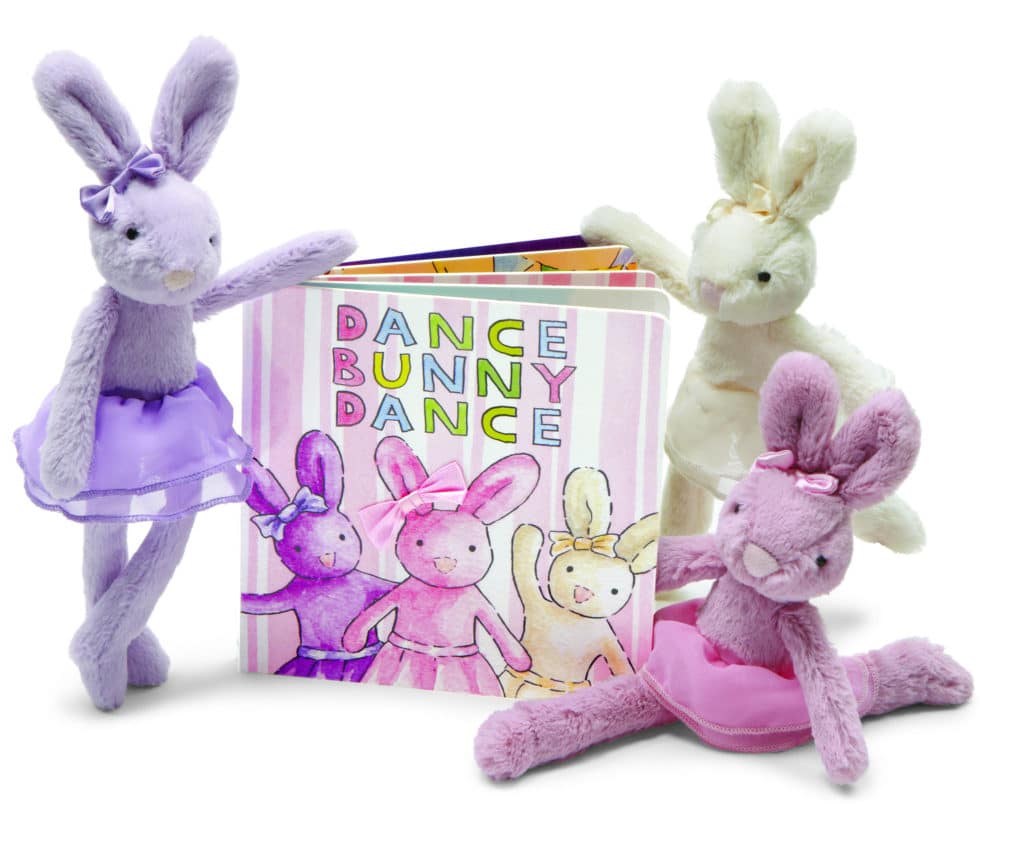 3 stuffy ballerina bunnies next to the book titled dance bunny dance