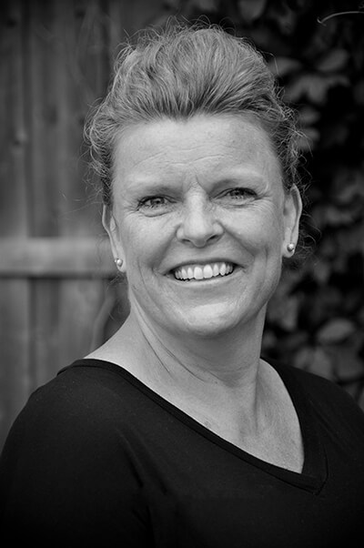 Milton dance class instructor and owner of the dance shoppe headshot in black and white