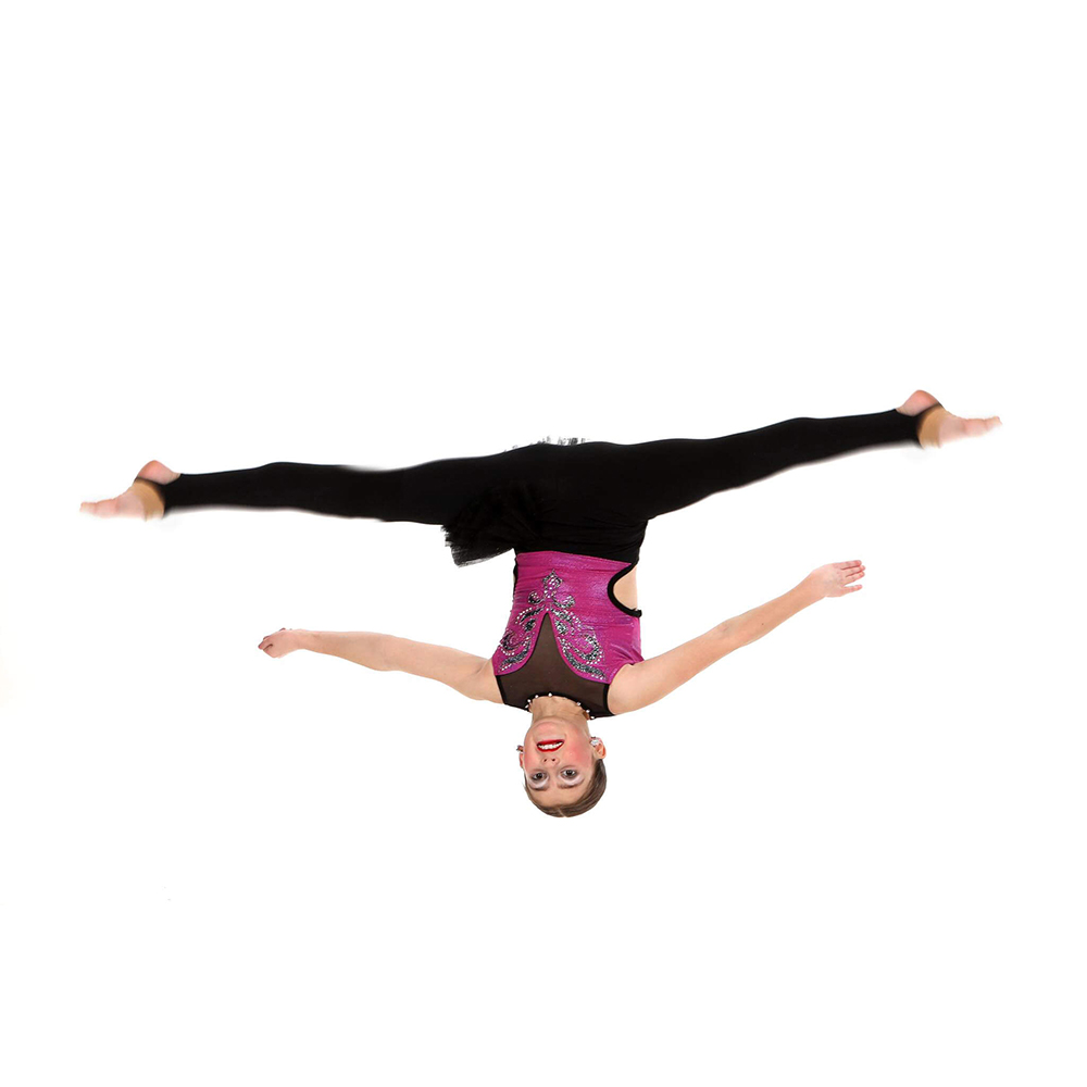10 year old acro dancer upside down in an acrobatic flip at The Dance Shoppe in Milton