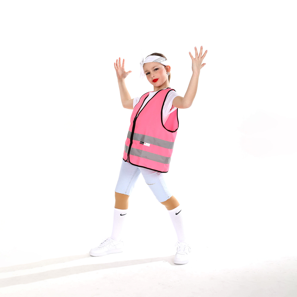 9 year old hip hop dancer in white with a pink construction vest doing a hip hop pose at The Dance Shoppe in Milton